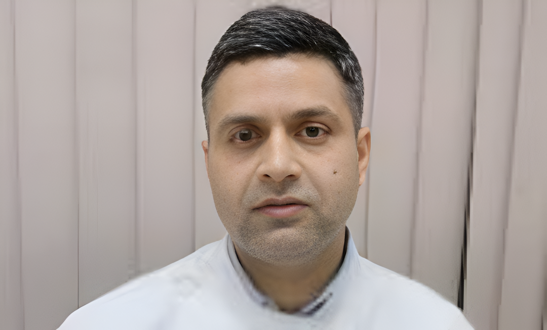 Dr. Gulshan Singh providing dental care